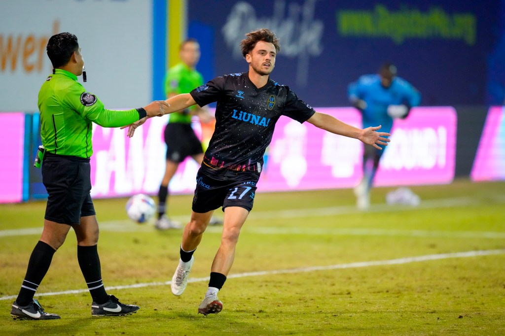 Las Vegas Lights FC forward Valentin Noël celebrating the club's first playoff win